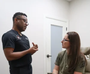Dr Slaughter discussing treatment with a patient